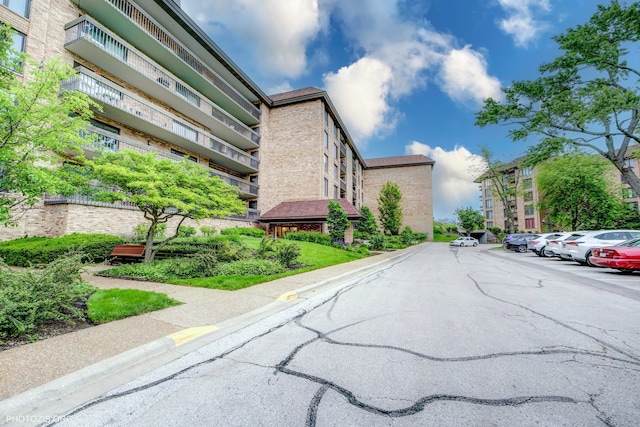 1621 Mission Hills Rd Unit 510, Northbrook, IL 60062 - view of asphalt road featuring sidewalks and curbs