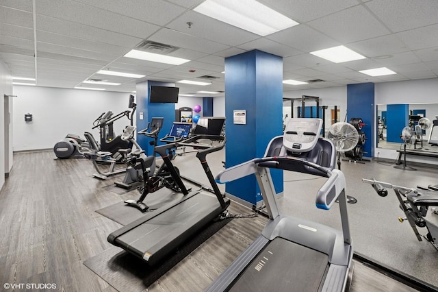 212 W Washington St Unit 1112, Chicago, IL 60606 - exercise room with a paneled ceiling and wood finished floors