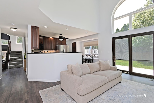 361 Lexington Ln, Grayslake, IL 60030 - living room with dark wood finished floors, recessed lighting, ceiling fan, stairway, and a towering ceiling