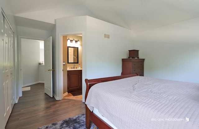 361 Lexington Ln, Grayslake, IL 60030 - bedroom with vaulted ceiling, a closet, dark wood-style floors, and ensuite bath