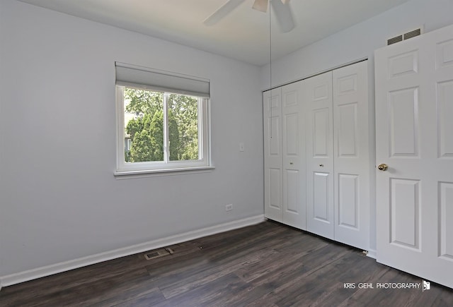 361 Lexington Ln, Grayslake, IL 60030 - unfurnished bedroom featuring dark wood-type flooring, a closet, and a ceiling fan