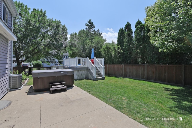 361 Lexington Ln, Grayslake, IL 60030 - fenced backyard with a hot tub, a patio area, and a wooden deck