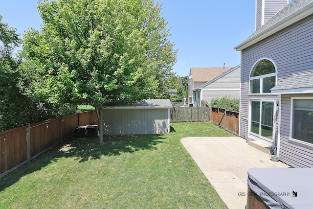 361 Lexington Ln, Grayslake, IL 60030 - fenced backyard with a patio and a storage unit