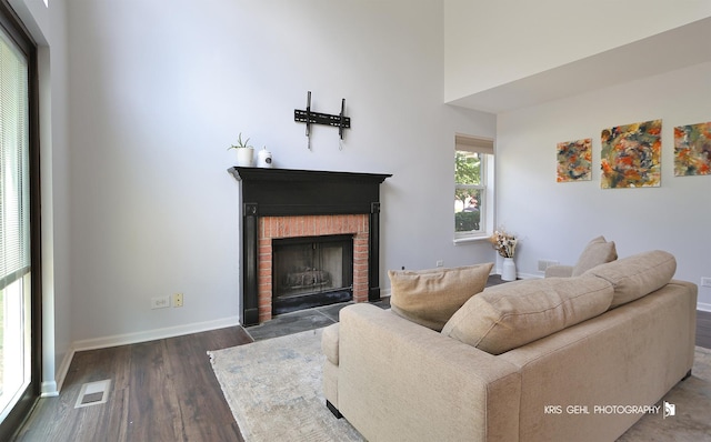361 Lexington Ln, Grayslake, IL 60030 - living room with a brick fireplace and dark wood-style floors
