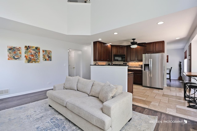361 Lexington Ln, Grayslake, IL 60030 - living room with ceiling fan, recessed lighting, light wood-style floors, and a towering ceiling
