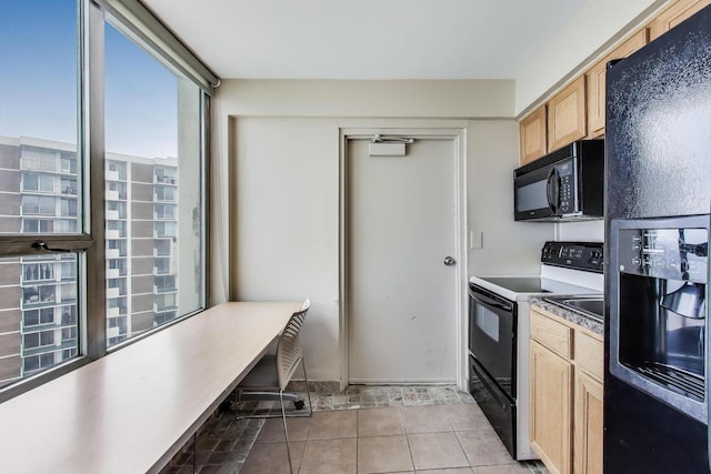 940 W Glenlake Ave Unit 19C, Chicago, IL 60660 - kitchen featuring black appliances, light brown cabinetry, and light tile patterned floors