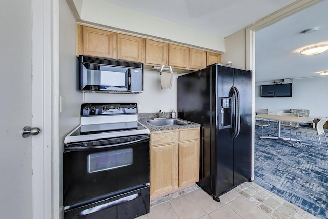 940 W Glenlake Ave Unit 19C, Chicago, IL 60660 - kitchen featuring black appliances, light brown cabinetry, and light tile patterned floors
