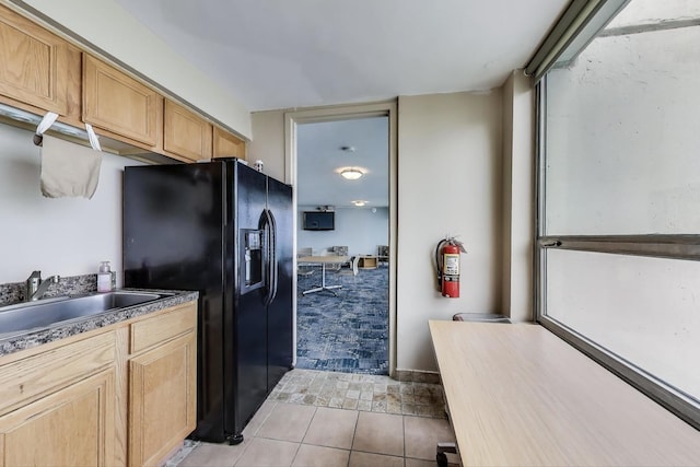 940 W Glenlake Ave Unit 19C, Chicago, IL 60660 - kitchen featuring black fridge and light tile patterned flooring