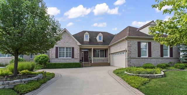 9 Aztec Ct, South Barrington, IL 60010 - view of front of house featuring brick siding, concrete driveway, an attached garage, and roof with shingles