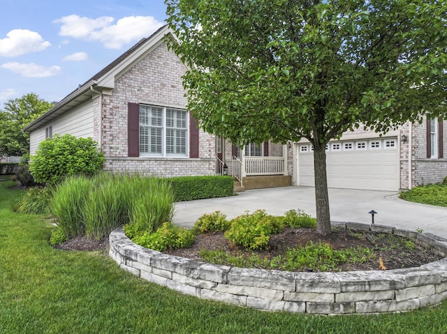 9 Aztec Ct, South Barrington, IL 60010 - view of front of house with brick siding, concrete driveway, an attached garage, and a front lawn