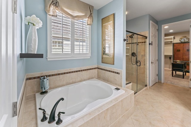 9 Aztec Ct, South Barrington, IL 60010 - full bath featuring a stall shower, a garden tub, tile patterned floors, and a spacious closet