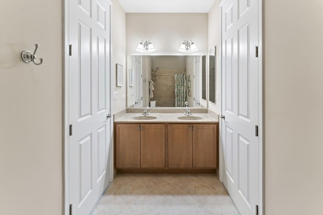 9 Aztec Ct, South Barrington, IL 60010 - full bath featuring double vanity, tile patterned flooring, and a shower