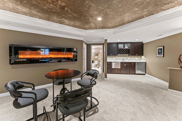 9 Aztec Ct, South Barrington, IL 60010 - dining area featuring bar with sink, a tray ceiling, light carpet, crown molding, and recessed lighting