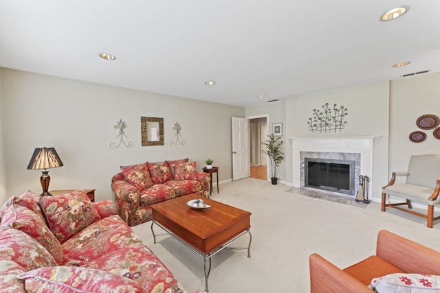 216 Hickory Ct, Northbrook, IL 60062 - carpeted living room with a high end fireplace and recessed lighting