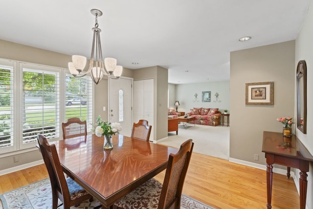 216 Hickory Ct, Northbrook, IL 60062 - dining area with a chandelier, light wood-style floors, and recessed lighting