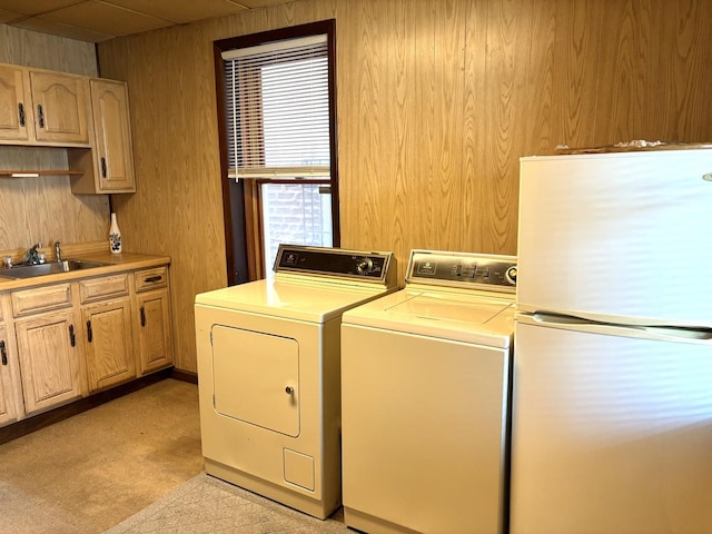 2838 S Keeley St, Chicago, IL 60608 - washroom with washer and dryer, wood walls, and light colored carpet