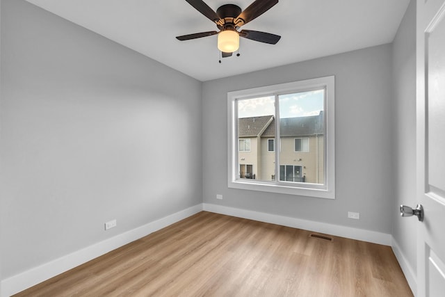 24642 George Washington Dr, Plainfield, IL 60544 - unfurnished room featuring wood finished floors and a ceiling fan