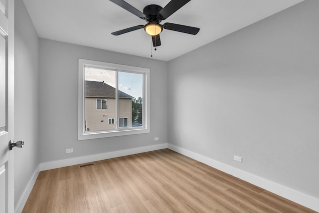 24642 George Washington Dr, Plainfield, IL 60544 - spare room featuring wood finished floors and a ceiling fan