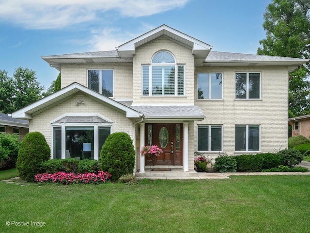 2612 Wilmette Ave, Wilmette, IL 60091 - view of front of home featuring a front yard and brick siding
