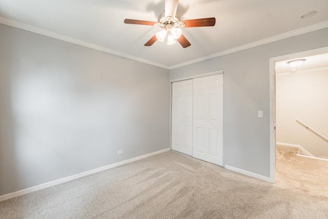 327 Georgetown Ct Unit B, Bloomingdale, IL 60108 - unfurnished bedroom with carpet floors, ornamental molding, a closet, and ceiling fan