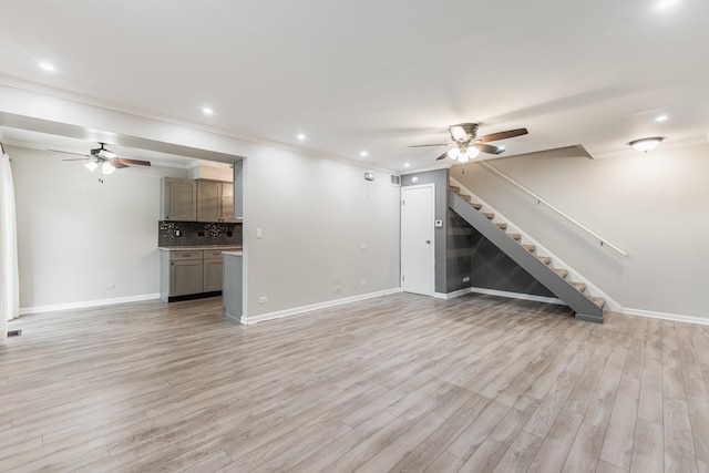 327 Georgetown Ct Unit B, Bloomingdale, IL 60108 - unfurnished living room featuring a ceiling fan, stairway, light wood finished floors, ornamental molding, and recessed lighting