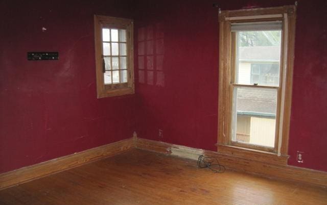 900 Willard St, Galesburg, IL 61401 - spare room with wood finished floors and baseboards