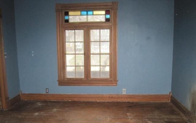 900 Willard St, Galesburg, IL 61401 - unfurnished room with baseboards and wood finished floors
