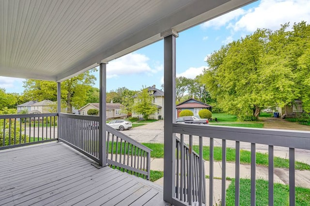515 George Ave, Waukegan, IL 60085 - wooden porch featuring a residential view