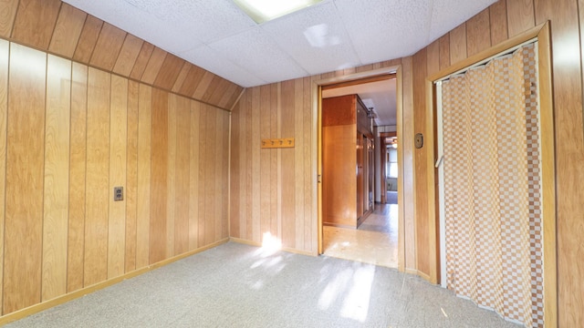 10747 S S Ave H, Chicago, IL 60617 - carpeted empty room with wood walls