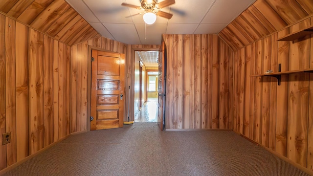 10747 S S Ave H, Chicago, IL 60617 - additional living space featuring ceiling fan, wooden walls, and carpet floors