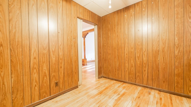 10747 S S Ave H, Chicago, IL 60617 - spare room with hardwood / wood-style flooring and wooden walls