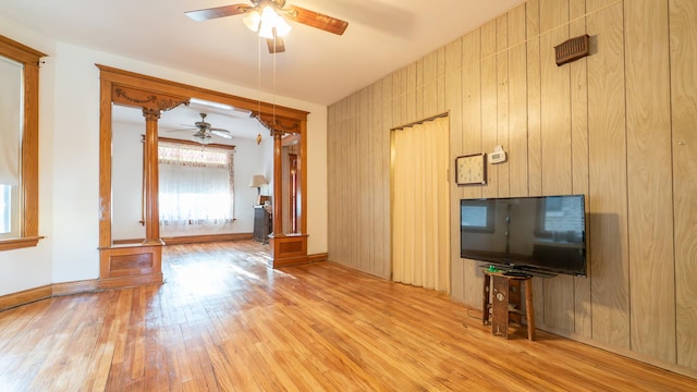 10747 S S Ave H, Chicago, IL 60617 - unfurnished living room with a ceiling fan and light wood finished floors