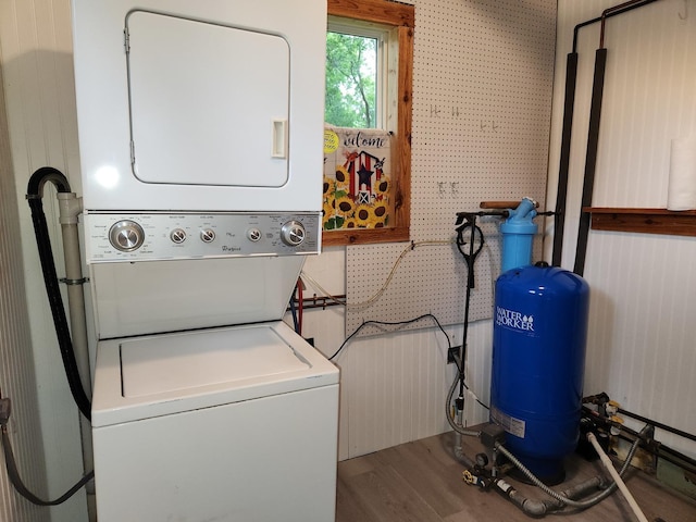 3100 W Brooke Ave, Waukegan, IL 60087 - laundry room featuring stacked washer and clothes dryer and wood finished floors
