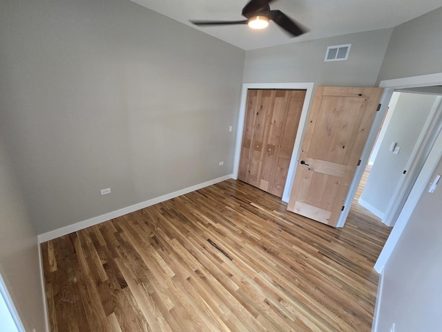 327 Lincoln Ave, Woodstock, IL 60098 - unfurnished bedroom with light wood-type flooring and a ceiling fan