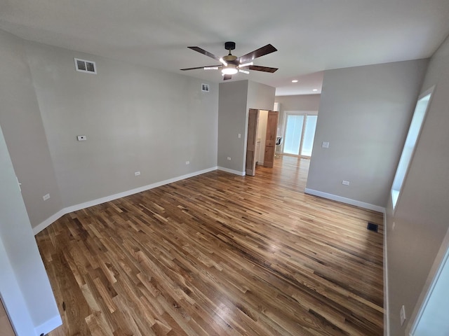 327 Lincoln Ave, Woodstock, IL 60098 - unfurnished room featuring wood finished floors, ceiling fan, and recessed lighting
