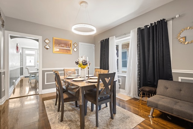 6921 26th St, Berwyn, IL 60402 - dining room with wood finished floors and a wainscoted wall
