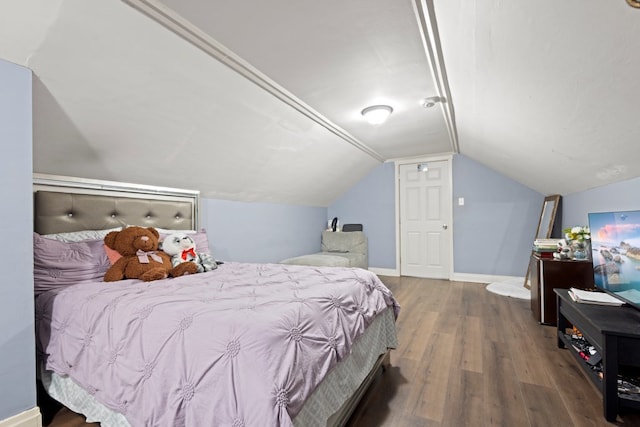 6921 26th St, Berwyn, IL 60402 - bedroom featuring wood finished floors and vaulted ceiling