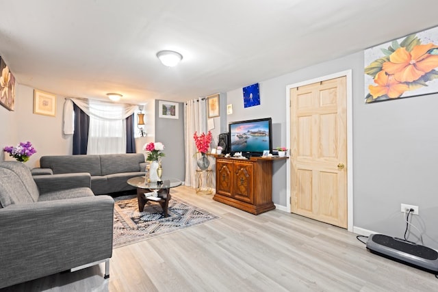 6921 26th St, Berwyn, IL 60402 - living room featuring wood finished floors and baseboards