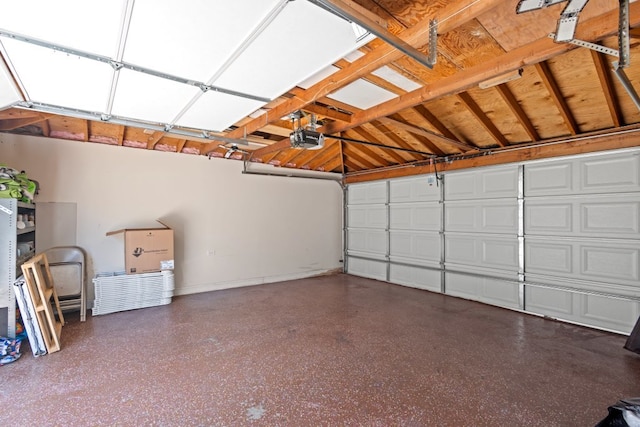 6921 26th St, Berwyn, IL 60402 - garage featuring a garage door opener and baseboards