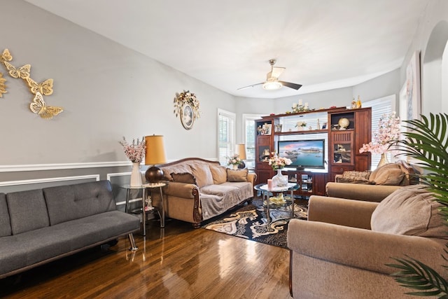 6921 26th St, Berwyn, IL 60402 - living room with wood finished floors, wainscoting, and a ceiling fan