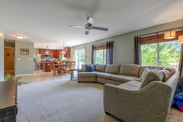 843 Brahms Rd, Volo, IL 60073 - living area featuring a ceiling fan and light carpet