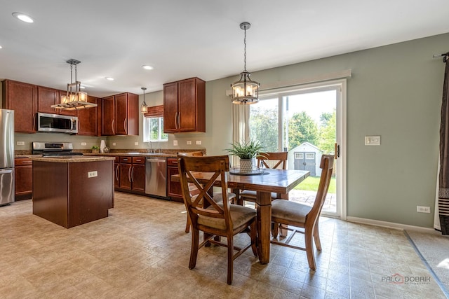 843 Brahms Rd, Volo, IL 60073 - dining area with a chandelier, recessed lighting, and light floors