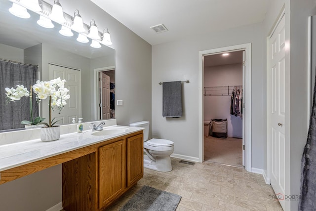 843 Brahms Rd, Volo, IL 60073 - bathroom featuring vanity and a spacious closet