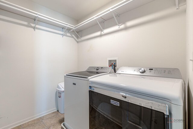 843 Brahms Rd, Volo, IL 60073 - laundry area with baseboards and separate washer and dryer
