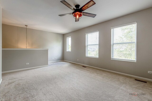 843 Brahms Rd, Volo, IL 60073 - carpeted empty room featuring a ceiling fan and baseboards