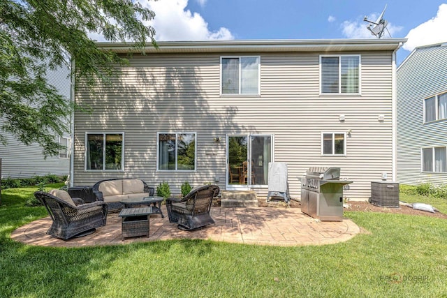 843 Brahms Rd, Volo, IL 60073 - back of house with an outdoor living space, entry steps, a lawn, and a patio