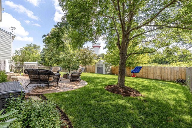 843 Brahms Rd, Volo, IL 60073 - fenced backyard with a storage shed, an outdoor living space, and a patio area