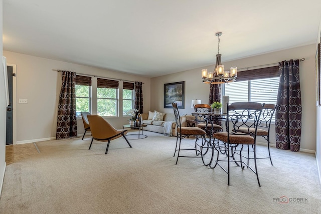 843 Brahms Rd, Volo, IL 60073 - dining space with light carpet and a chandelier