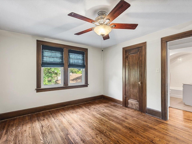 1639 Arlington Ave, Rockford, IL 61107 - unfurnished room with wood finished floors and a ceiling fan
