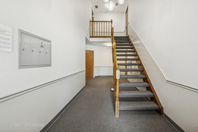 600 Hanover Ct Unit V1, Schaumburg, IL 60194 - staircase with carpet, a high ceiling, and mail area